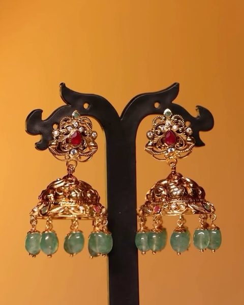 Antique jhumkas with ruby drop stud, cz stones and emerald bead fringe. Photographed at the shop.
