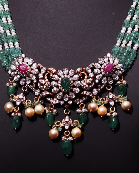 Victorian CZ necklace with ruby and emerald centres, emerald bead strands, pearl drops. Photographed at the shop.